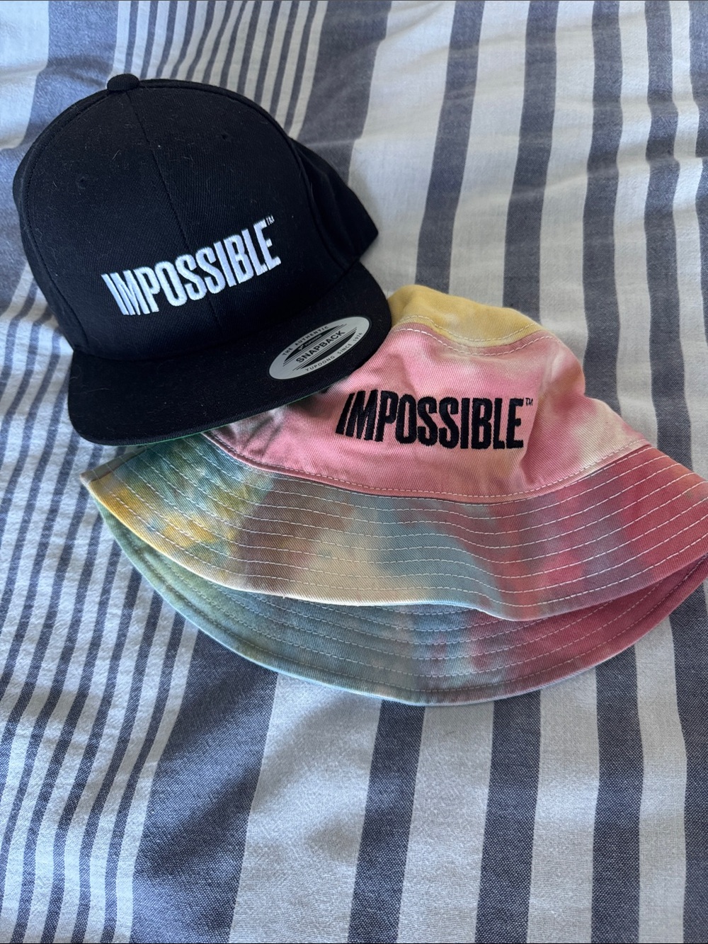 IMPOSSIBLE Foods Tie-Dye Bucket Hat and Black Snap Back Ball Cap Bundle